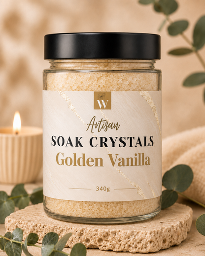 Jar of Golden Vanilla soak crystals with a candle in the background