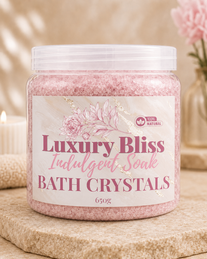 Jar of 'Luxury Bliss' bath crystals with a decorative label on a neutral background.