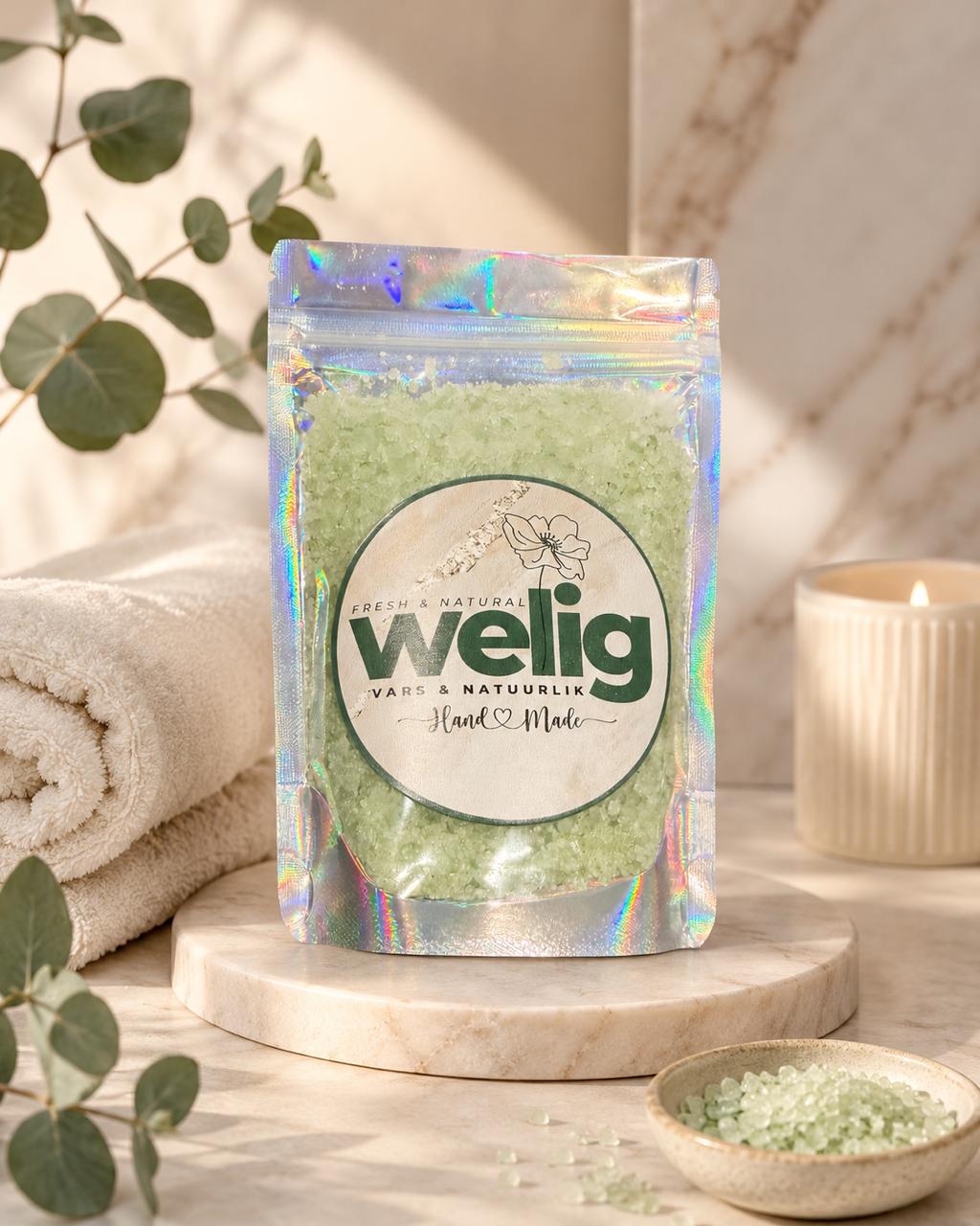 Packaged product with welig branding on a wooden surface with natural elements.