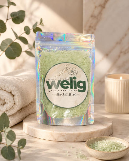 Packaged product with welig branding on a wooden surface with natural elements.